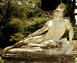 Dying Achilles, the most valuable statue of Achilleion represents Achilles dying trying to remove the spear from his ankle (1884)